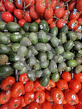 Food backgrounds Grocery store produce department tomatoes and Avocados