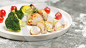 Food banner. Turkey breast meat and broccoli on a white plate. Delicious and healthy food. KETO diet concept