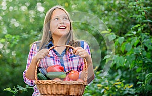 Food blogger. kid on summer farm. Organic food. harvest vitamin. spring market garden. little girl vegetable in basket