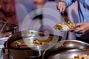 Food Buffet Catering Dining Eating Party Sharing Concept.people group catering buffet food indoor in luxury restaurant