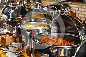 Food buffet catering dishes in steel bain-maries