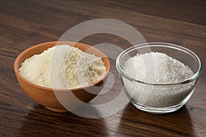 Food: Closeup of White and Brown Sugar Isolated on Wooden Background