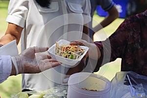 Food concept of hope : Free food for poor and homeless people donates food to food less people : The poor have been sharing food