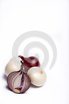 Food concept on white background, group of white and red onions