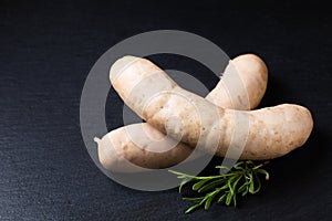 Food concept White sausages on black background with copy space