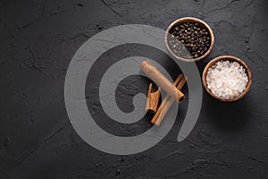 Food concept with wooden presentation board on black stone floor