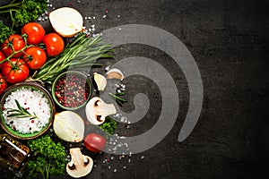 Food cooking background on black kitchen table.