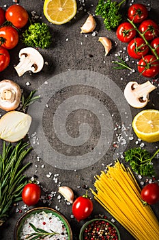 Food cooking background on black kitchen table.