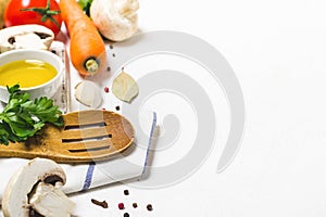 Food cooking background. Fresh vegetables, spices and mushrooms on white background