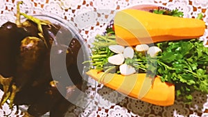Food, cooking, eggplant. Carrots, garlic, greens. Vegetables, healthy foods, diet. Vegetarian menu. Color video modern
