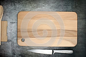 Food cutting board accompanied by a steel knife