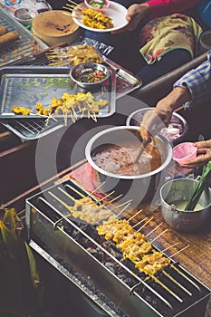 Food in Damnoen Saduak Floating Market near Bangkok, Thailand photo