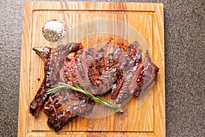 Food, delicious, horse meat and craft concept - serving of grilled steak