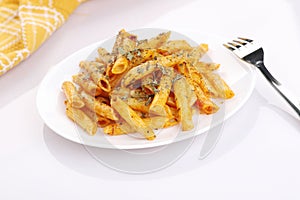 Food - Delicious Penne Pasta Plate with a Fork on White Background