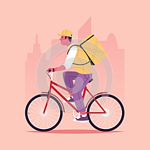 Food delivery service. A courier rides a bicycle to deliver an order against the backdrop of the city