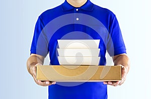 Food delivery service or order food online. Delivery man in blue