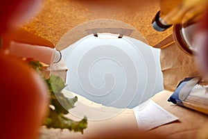 bottom view of food in paper bag photo