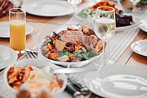 Food, dinner and party with drinks and table setting, celebration and holiday with Christmas or thanksgiving. Social