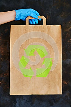 Food donation box. Woman delivering food in paper bag during Covid 19 outbreak