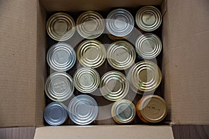 Food donations. canned food, cereals cardboard box. or food delivery concept.