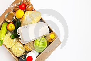 Food donations or food delivery concept in a cardboard box