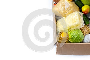 Food donations or food delivery concept in a cardboard box