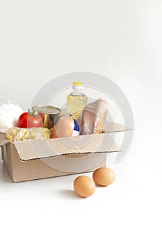 Food donations or food delivery concept. Food in a cardboard box