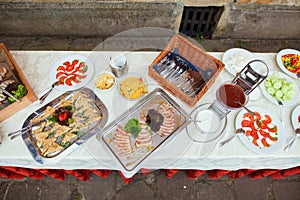 Food and drink at the restaurant. Table setting. Tasting dishes. Set of cold snacks, canape, beverages, closeup  parte meals