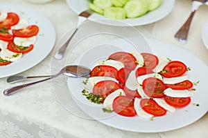 Food and drink at the restaurant. Table setting. Tasting dishes. Set of cold snacks, canape, beverages, closeup  parte meals photo