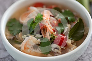 Food and drink, traditional Thai cuisine. Spicy tom yam kung, tom yum sour soup with shrimp, prawn, coconut milk