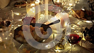 Food and drinks on table at home dinner party