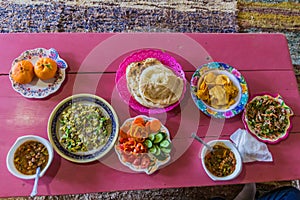Food in Egypt - Eggs, fuul (beans), salad, bread and frui