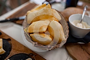 Food of Emilia Romagna region, deep fried bread gnocco fritto or crescentina served in restaurant in Parma, Italy photo