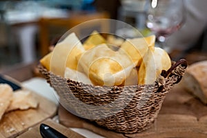 Food of Emilia Romagna region, deep fried bread gnocco fritto or crescentina served in restaurant in Parma, Italy photo