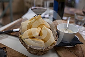 Food of Emilia Romagna region, deep fried bread gnocco fritto or crescentina served in restaurant in Parma, Italy photo