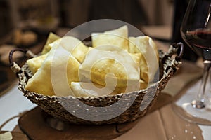 Food of Emilia Romagna region, deep fried bread gnocco fritto or crescentina served in restaurant in Parma, Italy photo