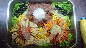 Food-flowers in tray. photo