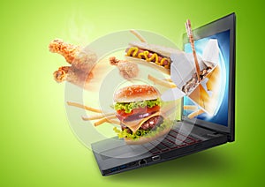 Food flying out of a laptop screen