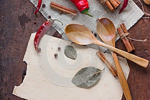 Food frame with spices on wood background. Flat lay, top view. Food background