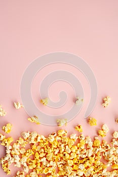 Food. Frozen Popcorn Corn Delicious Yellow Popcorn on Pink Background. Cinema. Copyspace. Place for Text.