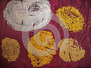 Food Grains, Rice grains On maroon background