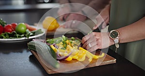 Food, hands and cooking, couple in kitchen together with vegetables and cutting board on counter. Health, wellness or