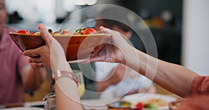 Food, hands and salad for lunch in dining room for celebration, party or event at modern home. Diet, bowl and closeup of