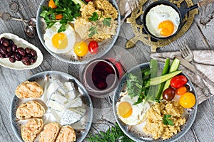 Food, healthy Breakfast, porridge, eggs, vegetables, sandwiches with caviar