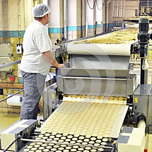 Food industry - biscuit production in a factory on a conveyor be