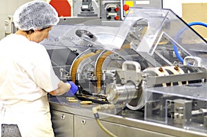 Food industry - biscuit production in a factory on a conveyor be