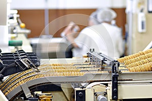 Food industry - biscuit production in a factory on a conveyor be