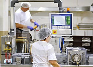 Food industry - biscuit production in a factory on a conveyor be photo