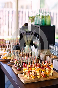 The food lies beautifully on table, laid out in order, beautifully decorated