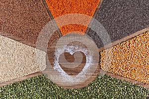 Food with love - plant based diversified diet concept with colorful grains and seeds